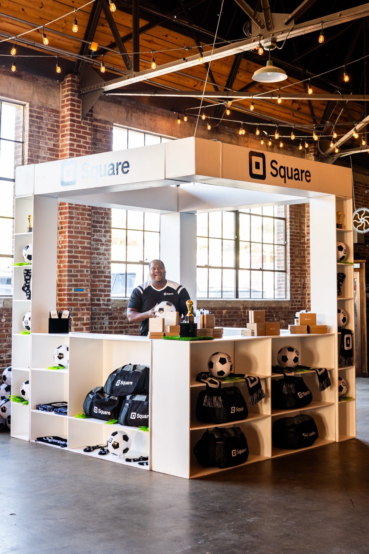 The Square booth stocked with soccer balls and gear at the Atlanta event